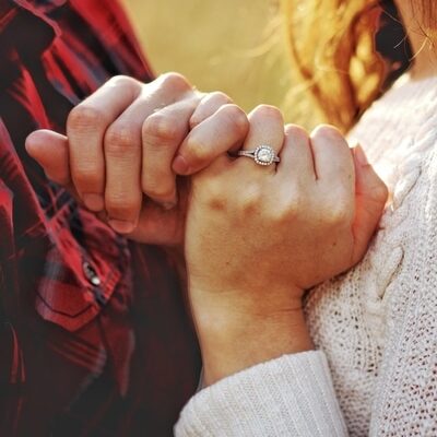 Engaged couple hands